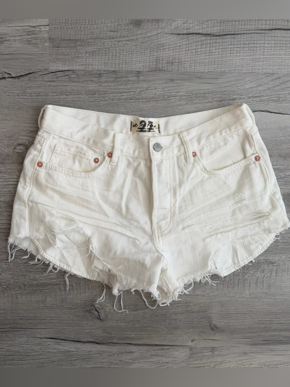 We The Free White Distressed Denim Cutoff Shorts